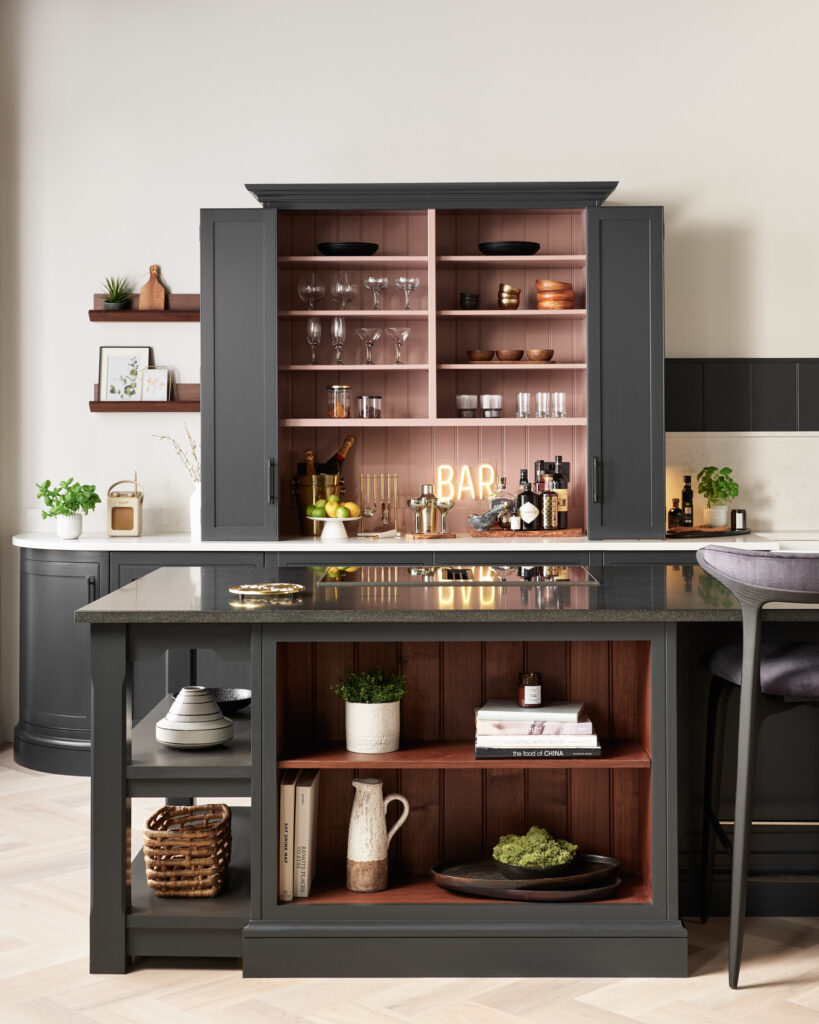 Black cabinetry in a monochrome kitchen setting